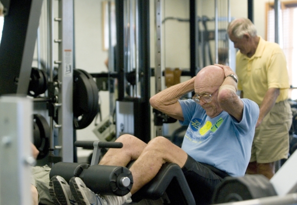 Charlie doing curnches on exercise machines 2011